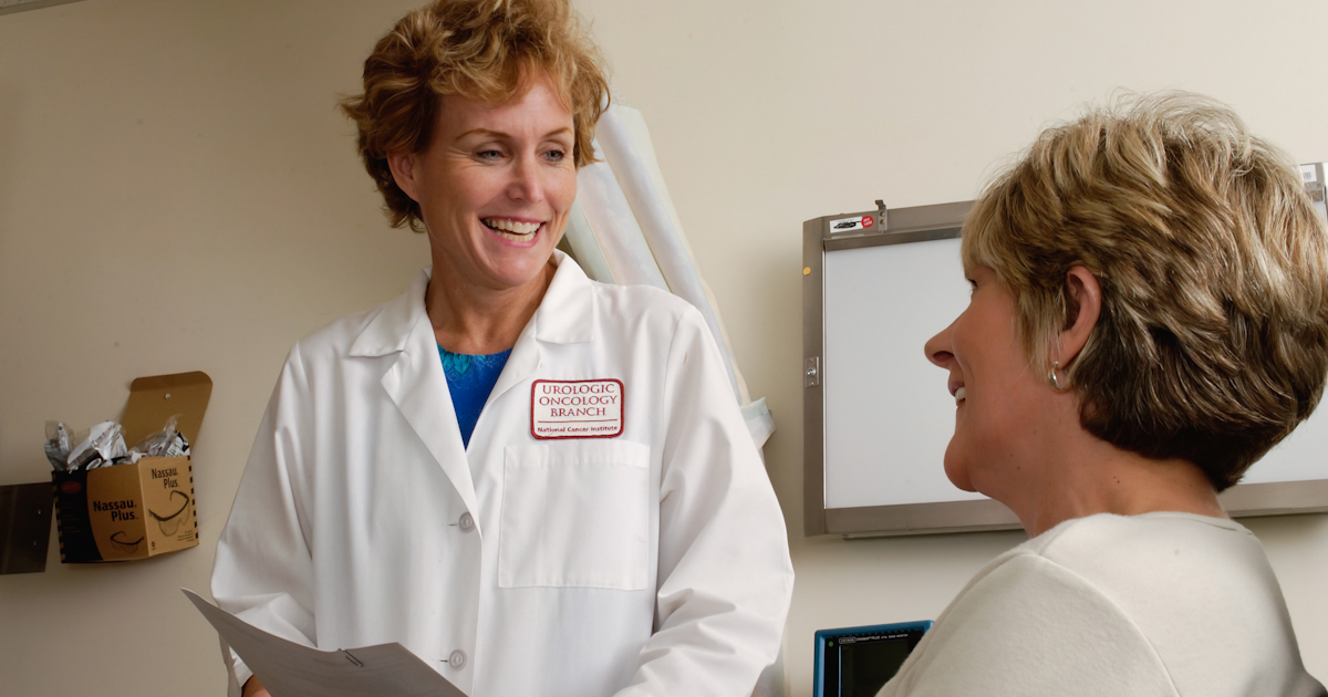 Pharmacist consulting with a patient about their medications